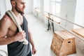 Portrait of fitness man with battle ropes at cross gym Royalty Free Stock Photo