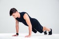 Portrait of a fitness man doing push ups Royalty Free Stock Photo