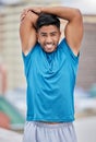 Portrait, fitness and man stretching arms in city getting ready for exercise, training or workout. Sports, healthcare