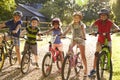 Portrait Of Five Children On Cycle Ride Together Royalty Free Stock Photo