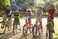 Portrait Of Five Children On Cycle Ride Together Royalty Free Stock Photo