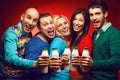 Portrait of five stylish close friends with milk product