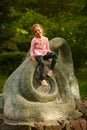 Portrait of a five year old girl sitting on a rock Royalty Free Stock Photo