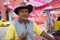 Portrait of an flamboyant rickshaw man, Malacca