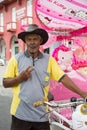 Portrait of an flamboyant rickshaw man, Malacca