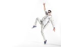 Portrait of a flexible man dancing and wearing a hygienic mask Royalty Free Stock Photo