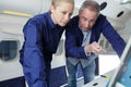 portrait flight mechanic checking something