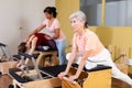 Elderly woman doing exercises on wunda chair in pilates studio Royalty Free Stock Photo