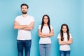 Portrait of focused three entrepreneurs ready to solve work company problems real executives wear white t-shirt denim