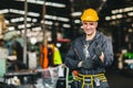 Portrait of foreman labor worker engineer working in industrial factory and waring safety suit happy smile hand show thumb up