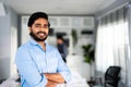 Portrait of formal business man confident successful. Indian businessman or manager in light blue shirt