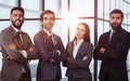 Portrait of four office workersr arms over their chest. Royalty Free Stock Photo