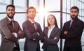 Portrait of four office workersr arms over their chest. Royalty Free Stock Photo