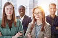proud professional group diverse business people stand in office with their arms crossed Royalty Free Stock Photo