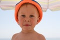 Portrait of four years boy on beach