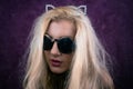 Portrait of freaky blonde girl in sunglasses Royalty Free Stock Photo