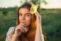 Portrait of freckled woman