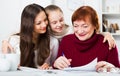 Happy family working with papers Royalty Free Stock Photo