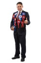 Put your trust in me. Portrait of a friendly looking politician wearing voting ribbons and giving you the thumbs up.