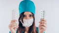 Portrait of a friendly smiling doctor woman or nurse in white medical uniform, on white background with copy space. Heal