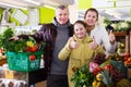 family satisfied with shopping in greengrocery