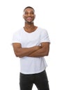 Portrait of a friendly young man smiling with arms crossed Royalty Free Stock Photo