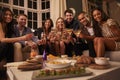 Portrait Of Friends With Drinks And Snacks At Party Royalty Free Stock Photo