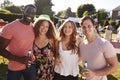 Portrait Of Friends Enjoying Drinks At Summer Garden Fete Royalty Free Stock Photo