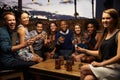 Portrait Of Friends Enjoying Night Out At Rooftop Bar Royalty Free Stock Photo