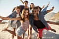 Portrait Of Friends Having Fun Together On Beach Vacation