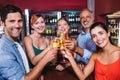 Friends toasting champagne glass in nightclub Royalty Free Stock Photo