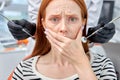 Portrait Of Frightened Redhead Female Patient Having Terrible Toothache, Pain