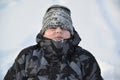 Portrait of frozen boy in winter