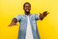 Portrait of frustrated man with poor sight stretching hands, searching way, blindness concept. indoor studio shot isolated on