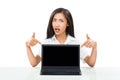 frustrated emotional woman pointing fingers at laptop Royalty Free Stock Photo