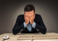 Portrait frustrated young man covering face with hands while