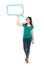 Portrait of full lenght young girl holding blank text bubble in Royalty Free Stock Photo
