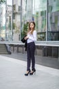 Portrait in full length, young business woman in white shirt Royalty Free Stock Photo