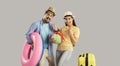 Portrait funky crazy couple with luggage beach accessory celebrate vacation time