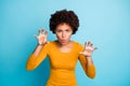 Portrait of funky frightening afro american girl want scary her friends on haloween party imagine she dangerous ghost Royalty Free Stock Photo