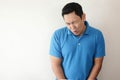 Funny Asian Man Crying When Peeing Royalty Free Stock Photo