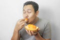 Funny Asian Man Enjoys Durian fruit Royalty Free Stock Photo