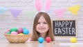 Portrait of funny child girl with bunny ears at Easter Day Royalty Free Stock Photo