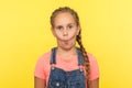 Portrait of funny comical little girl making fish face, child looking at camera with humorous stupid expression Royalty Free Stock Photo