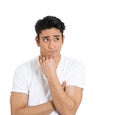 Portrait of a funny confused skeptical man thinking looking to the side Royalty Free Stock Photo