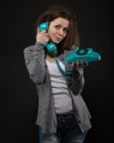 Portrait of the funny girl with old phone Royalty Free Stock Photo