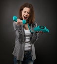 Portrait of the funny girl with old phone Royalty Free Stock Photo