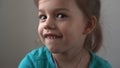 Portrait Funny little close up view happy preschool girl smiling child looking away thoughtfully, pretty natural face Royalty Free Stock Photo