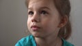 Portrait Funny little close up view happy preschool girl smiling child looking away thoughtfully, pretty natural face Royalty Free Stock Photo