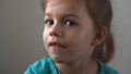 Portrait Funny little close up view happy preschool girl smiling child looking away thoughtfully, pretty natural face Royalty Free Stock Photo